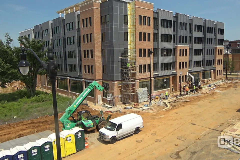 New five-story apartment building under construction.